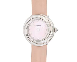 308 Cartier: An 18K White Gold and Diamond 'Trinity' Watch Dial: 17.25 mm, round pink mother-of-pearl dial with diamond set hour markers Case: 28.00 mm Case number: 71662CD Closure: pink leather strap with an 18k white gold buckle clasp Signed: with original box Inner circumference: 6 3/4 - 8 in. 37.4 grams gross Estimate: $8,000 - $12,000
