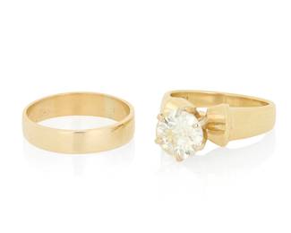 162 A 14K Gold and Diamond Ring Set Centering a round brilliant-cut diamond weighing 2.04 carats in a high mount design together with a high polish gold band 2 pieces Size: 7 1/2 and 8 9.9 grams gross Accompanied by a GIA Report numbered #2245029352, dated August 6, 2026, stating the diamond as Natural with a color grade of N and a clarity grade of I1, no fluorescence. Estimate: $3,000 - $5,000