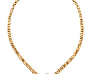 141 Bulgari: An 18K Gold and Ancient Roman Coin 'Monete' Necklace Featuring a curb link chain centering a Cizico Constantinus I Aug A.D. 307-337 coin, signed Bulgari with Italian workshop marks Length: 20 in. 69.7 grams gross Estimate: $18,000 - $25,000