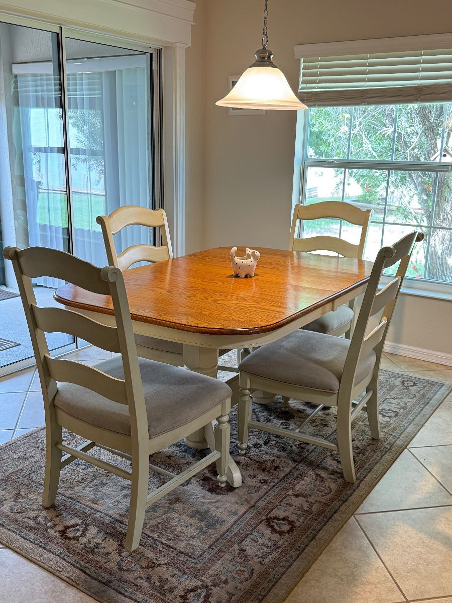 COASTAL TWO-TONE DINING SET: 5-Piece Dining Set • Warm Wood-Grain Top • Soft Cream Finish • Pedestal-Style Base • 4 Neutral Upholstered Seats • Ladder-Back Chairs • Casual Coastal / Transitional Style