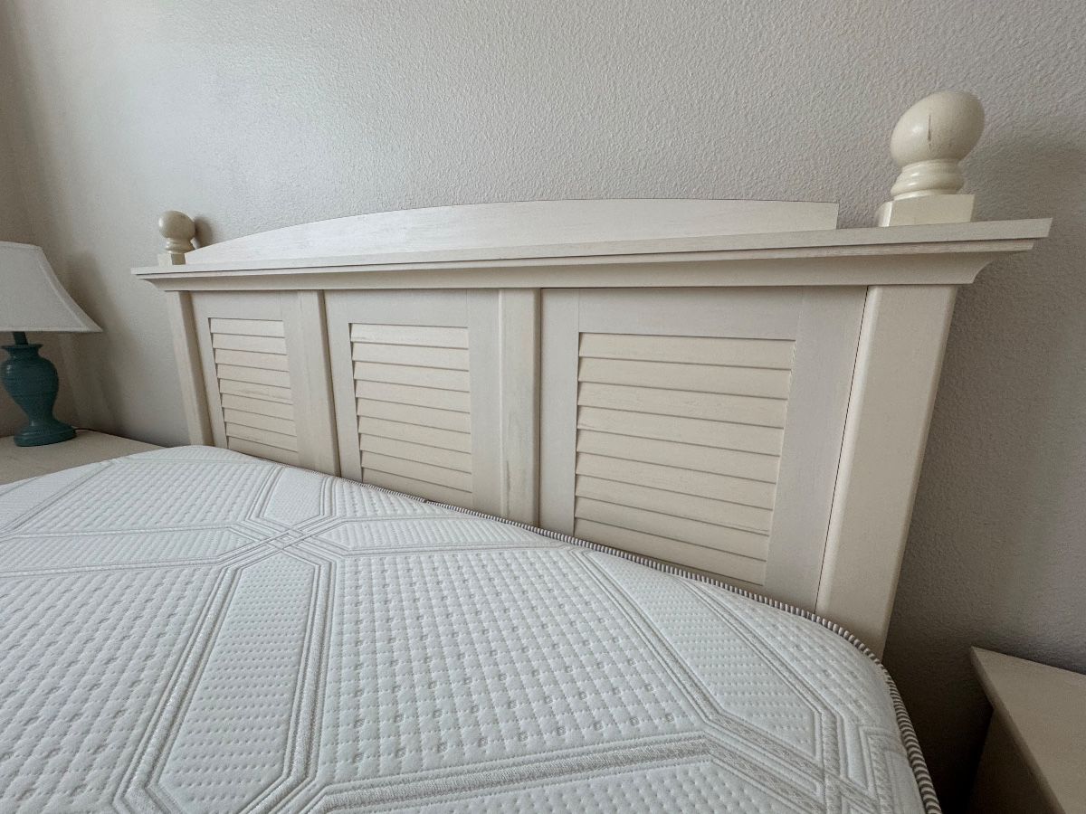 COASTAL COTTAGE QUEEN BEDROOM COLLECTION: Distressed Cream Finish • Louvered/Shutter Detailing • Wood Drawer Boxes • Metal Drawer Glides Coastal Cottage Queen Headboard: Distressed Cream Finish • Louvered/Shutter Panels • Decorative Posts & Finials Coastal Cottage Dresser & Mirror: Louvered Cabinet Doors • Multiple Storage Drawers • Wood Drawer Boxes • Metal Drawer Glides • Coordinating Framed Mirror. Coastal Cottage Nightstands: Distressed Cream Finish • Drawer with Metal Glides • Open Display/Storage Shelf • Bun Feet
