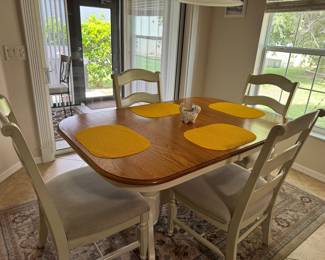 COASTAL TWO-TONE DINING SET: 5-Piece Dining Set • Warm Wood-Grain Top • Soft Cream Finish • Pedestal-Style Base • 4 Neutral Upholstered Seats • Ladder-Back Chairs • Casual Coastal / Transitional Style