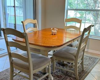 COASTAL TWO-TONE DINING SET: 5-Piece Dining Set • Warm Wood-Grain Top • Soft Cream Finish • Pedestal-Style Base • 4 Neutral Upholstered Seats • Ladder-Back Chairs • Casual Coastal / Transitional Style