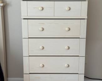 COASTAL COTTAGE TWIN BEDROOM SET: Distressed Cream Finish • Louvered/Shutter-Style Headboard • Coordinating Tall Chest • Coastal Cottage / Island-Inspired Design Coastal Cottage Twin Headboard: Distressed Cream Finish • Louvered/Shutter Panels • Decorative Posts & Ball Finials Coastal Cottage Tall 5-Drawer Chest: Distressed Cream Finish • Wood Drawer Boxes • Metal Drawer Glides • Bun Feet • 31 x 17.75 x 50