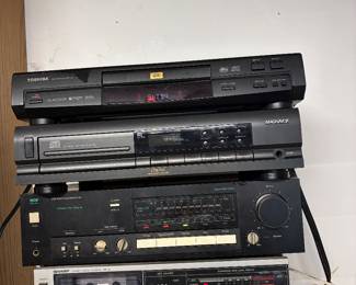 Toshiba, DVD player, Magnavox, DVD player, MCB tuner, Sharp cassette deck.