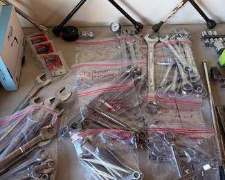 Sets of Open/closed ended wrenches.