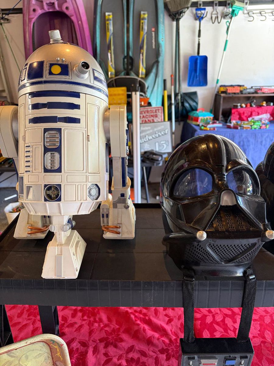 Vintage R2D2 and Darth Vader battery operated toys.