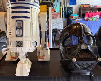 Vintage R2D2 and Darth Vader battery operated toys.