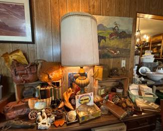 Western leather purses, belt buckles, nut crackers, and old dominos 