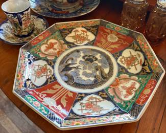 Antique Japanese Imari porclain charger with central medallion, cup and saucer, bowls and saucer, amber shakers