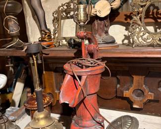 Fireplace mantel, antique water pump made into a lamp