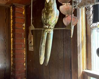 Tin Parrot on swing