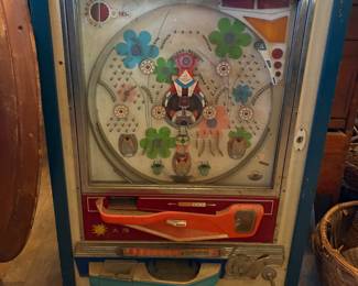 Vintage 1970's Japanese mechanical Pachinko machine possibly made by Nishiji featuring classic central spinner design.