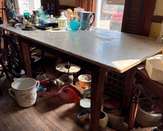 Family says this is aWonderful candy making table. their grandmother used. Dimensions to followSlab of marble on sturdy legs