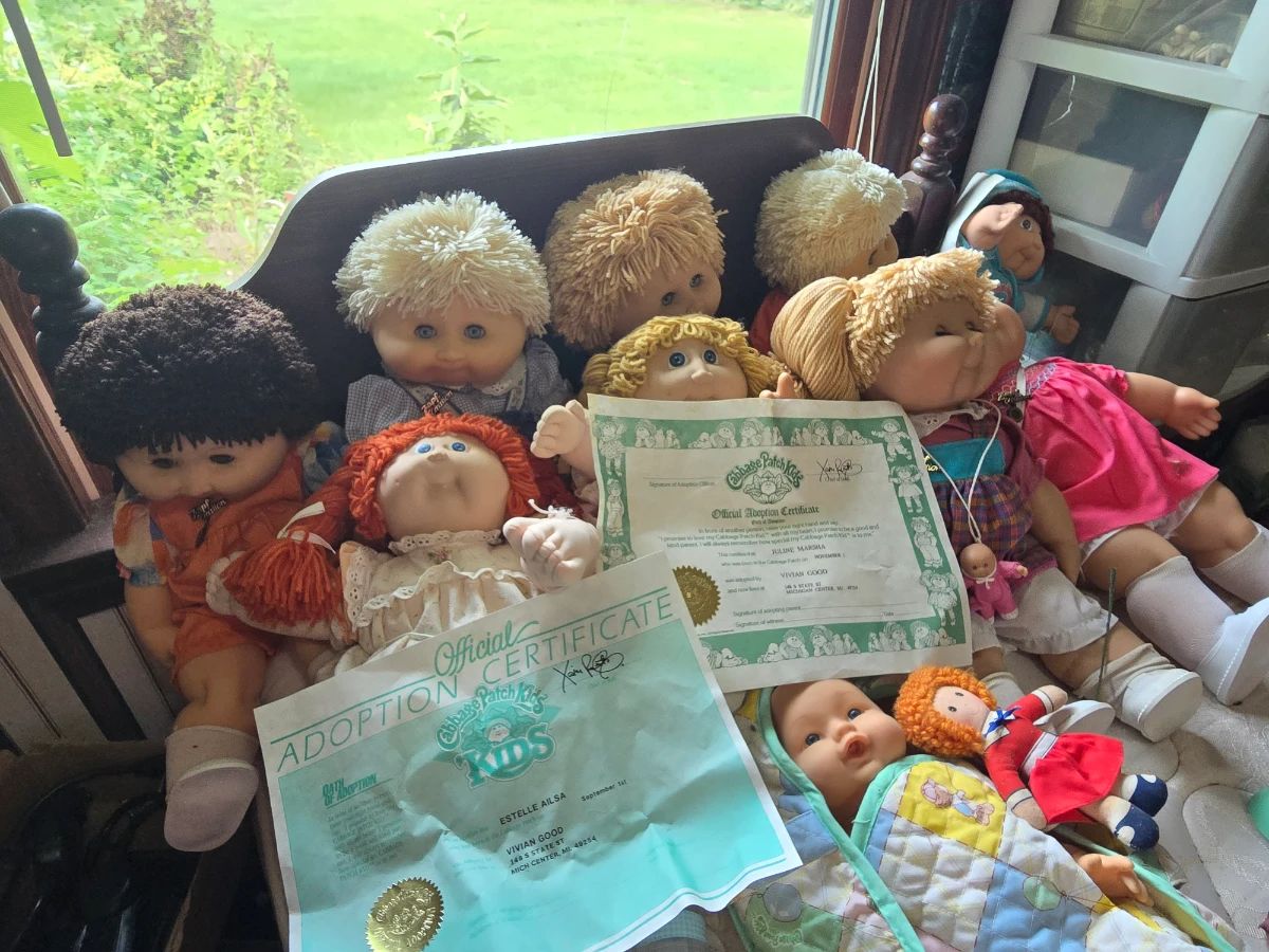 Vintage cabbage patch dolls with original adoption papers and vintage Zapf Creation Tolpatsch dolls