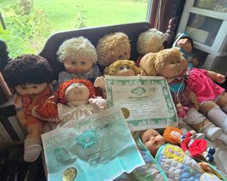 Vintage cabbage patch dolls with original adoption papers and vintage Zapf Creation Tolpatsch dolls