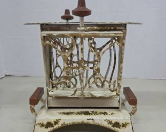 	Mechanical Cast Iron Toaster Circa 1920s