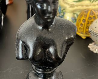 black classical-style female bust figurine