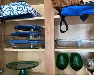 glass food storage containers, a pedestal cake stand, wine glasses