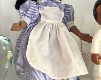 vintage porcelain collectible doll dressed in a traditional nurse's uniform