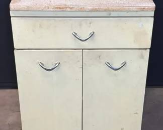 Vintage Midcentury Yellow Metal Base Cabinet With Formica Top And Curves Chrome Handles