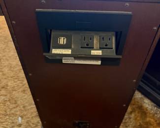 The Chairside Table with Power has a cETLus-listed power strip mounted on the back with 2 outlets and 2 USB ports.