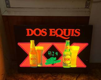 Vintage illuminated Dos Equis sign