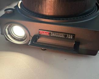 vintage Kodak Carousel 700 35mm slide projector with a circular tray