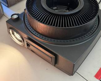 vintage Kodak Carousel 700 35mm slide projector with a circular tray