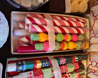 Boxes of colorful tapers