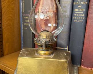 one of a pair of unusual brass oil lamps…one chimney missing.