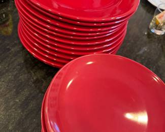 lots of red dinner and luncheon plates