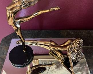 Bronze sculpture of two nude female figures in modernism style by Tom Bennett