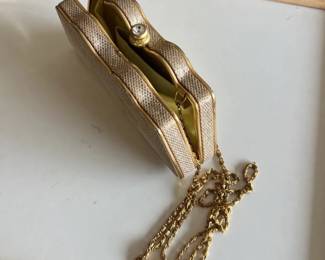 Vintage gold tone metal mesh clutch with crystal clasp and chain strap