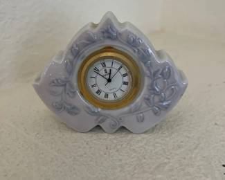 Lladro porcelain quartz, mantle clock with floral relief details