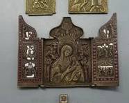 SET OF FIVE RUSSIAN ORTHODOX BRASS BRONZE AND ENAMEL ICONS WITH TRIPTYCHS