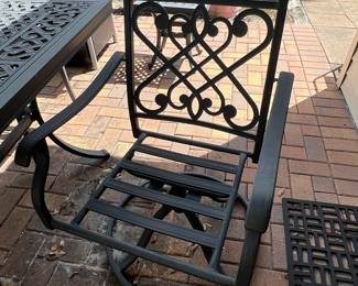 Cast Aluminum Patio Dining Set with Swivel Chairs and Striped Cushions