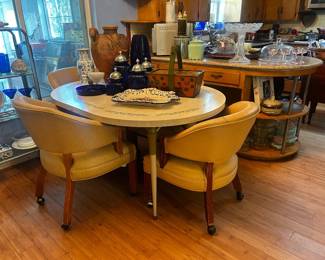 Table and chairs sold separately as the are not a matching set.