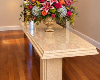 Lush Floral Centerpiece in Warm Marble Entryway