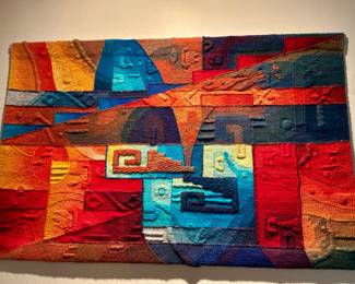Vibrant, abstract, woven textile tapestry