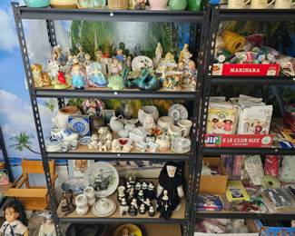 Collectible Planters and more. Metal shelves not for sale