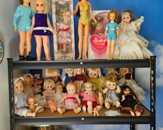 Dolls. Metal shelves not for sale