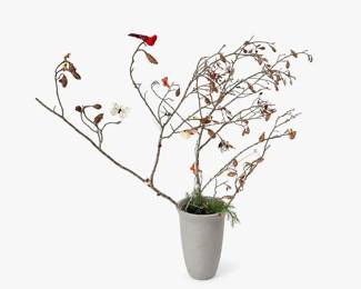 Decorative Branch and Butterfly Sculptural Arrangement in Gray Pot
Price: $50.00
Condition: Good
Tall, sparse branch arrangement with many small twig offshoots, dried-leaf/butterfly accents, and a smooth cylindrical gray vase or cachepot base. The piece reads as a decorative sculptural floral display, likely made from natural or mixed media elements.