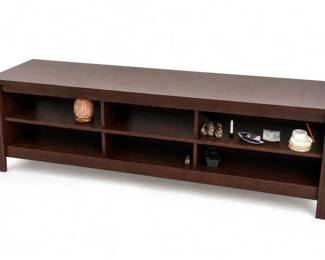 Modern Walnut Open-Storage Media Console
Price: $165.00
Condition: Good
Long low rectangular wood console with open front shelving divided into multiple cubbies. Dark walnut-toned finish, flat top, vertical end supports, and a minimalist mid-century-inspired profile. Likely intended as a media console or credenza.