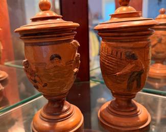 Carved wood urns
