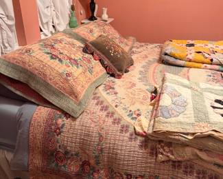 Queen Bed. With quilts