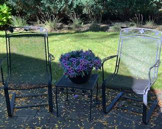 Classic wrought iron outdoor armchairs