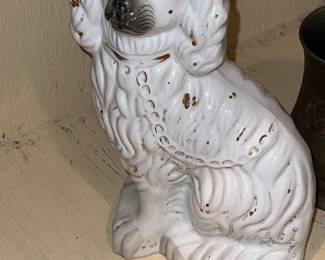Antique white-glazed Staffordshire spaniel dog figurine