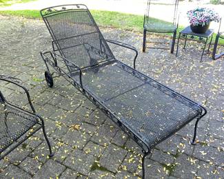 Classic black wrought iron lounge chair