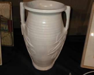 image appears to be a vintage McCoy Pottery Sand Dollar Floor Vase from the 1940s, featuring a white matte finish, ribbed neck, and side handles with embossed leaf or sand dollar motifs.